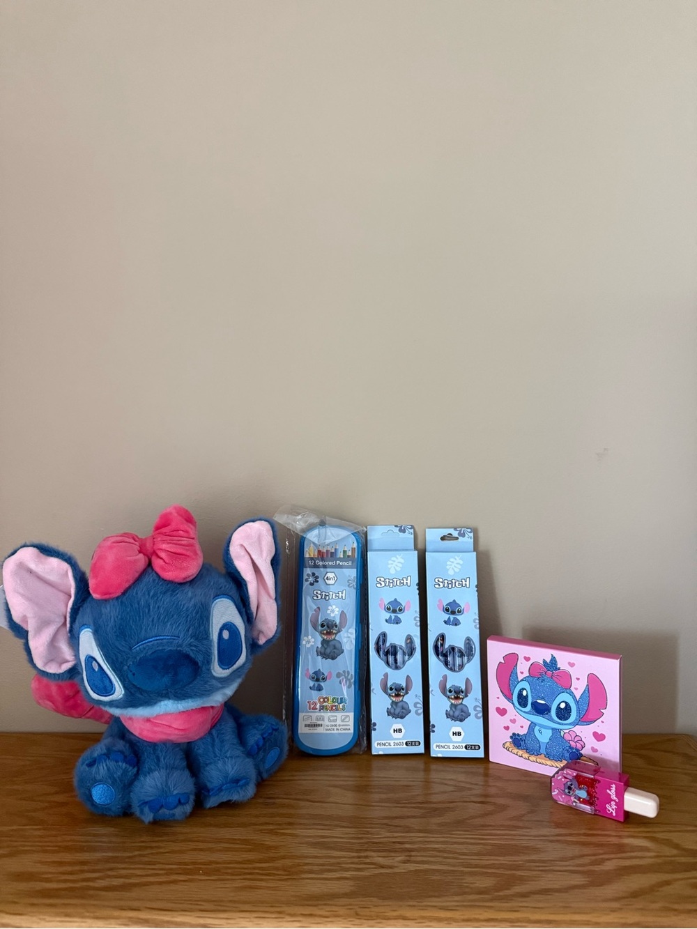 Stitch Plush, HB Pencils, Colored Pencils, Lip Gloss & Eyeshadow